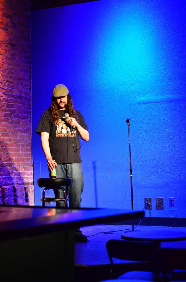 Local comedian George Cruickshank preforms stand up during open mic night at the Accord on Feb. 23, 2016.
