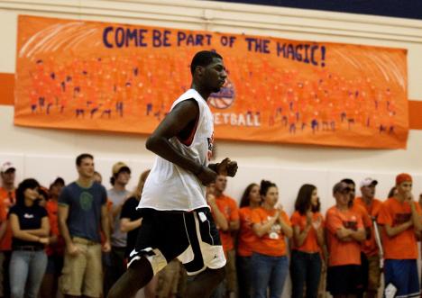 With members of Illinois athletic boosters and clubs cheering him on, prospect Julian Wright runs down the court in the Ubben Basketball Facility on Saturday. Wright, a sought-after prospect, has narrowed his list of potential schools down to DePaul, Ari Online Poster
