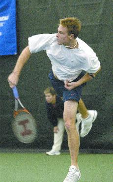 Junior Chris Martin sends the ball back to his opponent at the Big Ten Singles Championships at the Atkins Tennis Center on Nov. 15, 2003. Daily Illini File Photo
