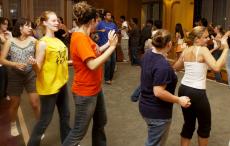 Students learn an energetic dance at the Indian Dance Club workshop held at LAR Tuesday night. Alex Nowak
