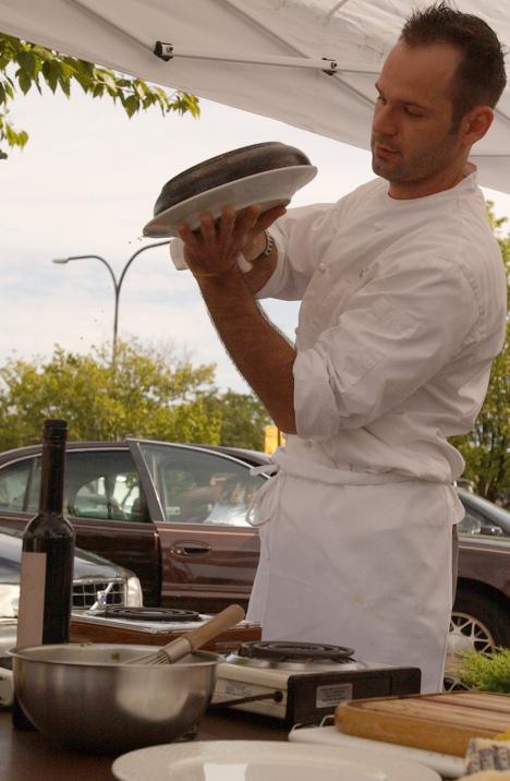 Chef Thad Morrow prepares a Duck Egg Fritatta at the Urbana Farmer´s Market Saturday. Morrow, owner of Bacaro, a restaurant in Champaign, cooked for Food for Thought, an awareness group for local food producers. Hopefully we´ll raise awarenes Dan McDonald
