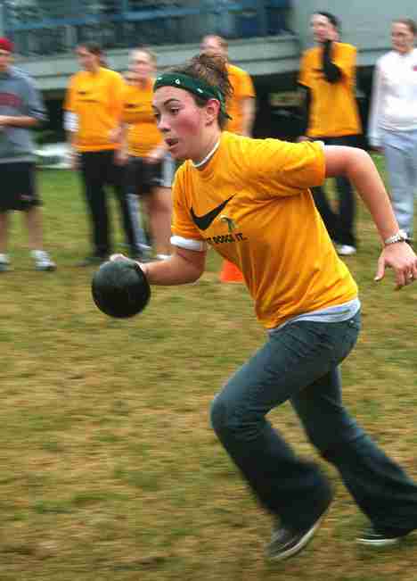 Samantha Smith, freshman in LAS, prepares to throw a dodgeball during the Dodging to Make a Difference dodgeball tournament, a philanthropic event held by Alpha Epsilon Phi and Alpha Epsilon Pi at Washington Park in Champaign Friday afternoon. Although Shira Weissman
