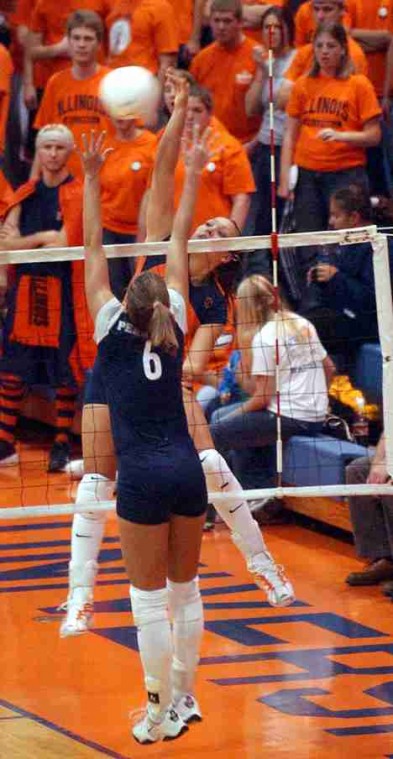 Illinois´ Rasa Virsilaite (8) spikes the ball over the head of Penn State´s Sam Tortorello (6) on Oct. 22 at Huff Hall. Penn State defeated Illinois 3 games to 1.. Online Poster
