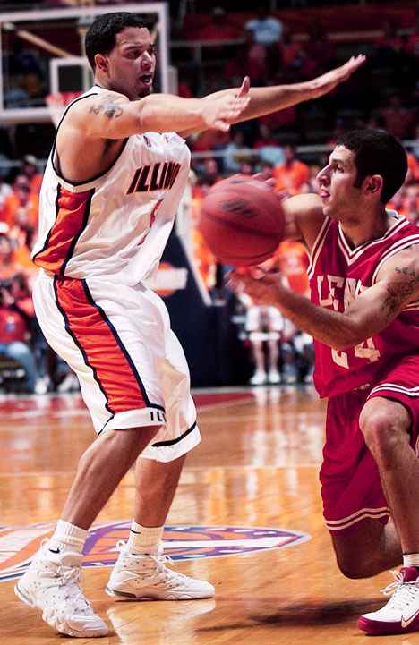 Illinois forward Deron Williams (5) guards Lewis State´s Anthony Scala (24) Sunday at Assembly Hall. Illinois defeated Lewis State 92-61. Online Poster
