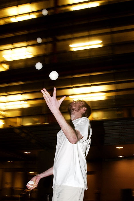 Keith Amling, junior in engineering and member of the Illini Juggling and Unicycle Club, juggles during a homework break early Wednesday morning outside of the Siebel Center at the corner of Matthews Avenue and Stoughton Street in Urbana. Online Poster
