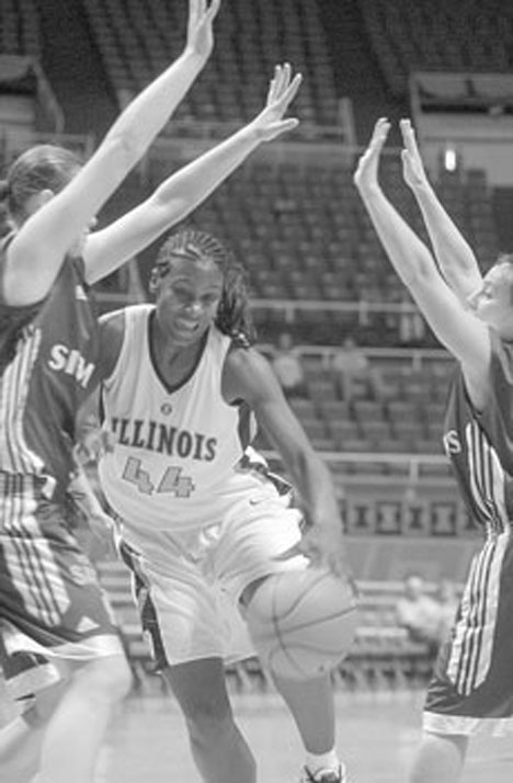 Illinois forward Brittney Daugherty (44) drives against BK Poprad (Slovakia) defenders in an exhibition game Sunday at Assembly Hall. Illinois won 114-74. Online Poster
