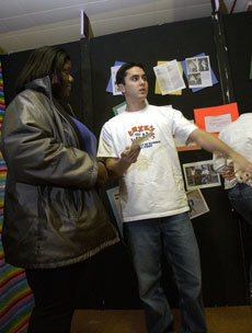 Two participants of Boxes and Walls talk during the event in October 2003. The event was canceled this year due to space constraints. Daily Illini File Photo
