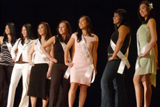 Contestants of the Miss Asian UIUC Pageant line up on stage at Foellinger Auditorium Friday night. Representatives from 10 different clubs competed in the show as part of Asian-American history month. Lauren Lenkowski
