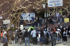 Protestors for and against the chief gather at the Swanlund Administration Building on Thursday April 15, 2004. Today is the one- year anniversary of the start of the lockout. Daily Illini file photo
