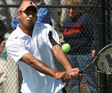 Illinois´ Pramod Dabir hits a return during a doubles match against Ohio State´s Joey Atas and Drew Eberly April 3 at the Atkins Tennis Center. Dabir and partner Kevin Anderson won the match 4-3. Illinois plays Northwestern and Wisconsin this Online Poster
