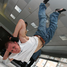 Mark Beronilla, senior in engineering, practices break dancing in Allen Hall´s main lounge on Sunday afternoon as part of UC Hip-Hop´s weekly session. They are practicing this week for Hip-Hop Awareness week, which culminates in a break dancin Online Poster
