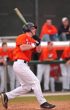 Illinois´ Ryan Rogowski watches his solo home run sail over the right field fence in the first inning against Western Michigan on Tuesday at Illinois Field. Online Poster
