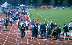 Participants in the Relay for Life walk around the track at the Soccer and Track Stadium Friday evening. Teams raised money to benefit cancer research and then walked on the track from 7 p.m. Friday until 7 a.m. Saturday. Online Poster
