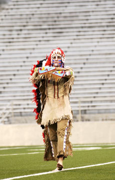 Kyle Cline is the 35th University student to portray Chief Illiniwek. He will continue in the role next year. Online Poster
