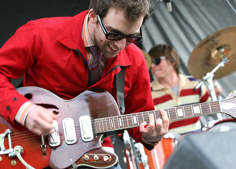 Guitar player Robert Hirschfeld and drummer Matt Campbell play with Champaign band Col. Rhodes at Band Jam 2005 Sunday afternoon at Washington Park. The event, sponsored by the Buzz and WPGU, featured bands playing throughout the afternoon and into the ni Online Poster
