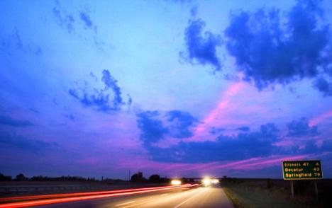 Cars drive into the sunset on Interstate 72 Saturday evening. Austin Happel
