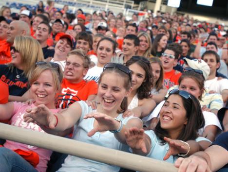 Students participate in a cheer at Memorial Stadium as part of the first Thursday pep rally for Block-I, the student cheering section for Illinois football. At the event, Block-I members signed-up new recruits and explained all traditions, procedures and Josh Birnbaum
