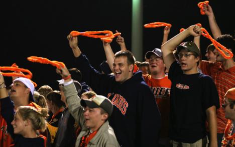 Illinois fans wave Hawaiian leis and cheer during the women´s soccer game on Friday at the Illinois Soccer Stadium. Josh Birnbaum
