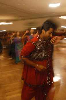 Palak+Shah%2C+senior+in+engineering%2C+and+other+students+dance+at+the+Garba+Raas+Bhangra+Indian+dance+held+at+the+Illini+Union+Saturday+evening.+Austin+Happel%0A