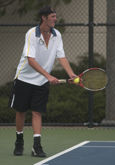 Monte Tucker prepares to serve during practice at the Atkins Tennis Center on Tuesday. Nick Kohout
