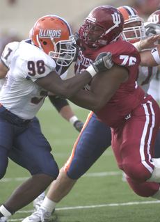 Illinois defensive lineman Xavier Fulton fights a block from Indiana´s Isaac Sowells during Saturday´s game. Peter Hoffman
