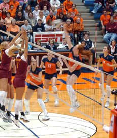 Illinois player Rachel Van Meter spikes the ball during the second of four games versus Minnesota at Huff Hall on Oct. 16. Van Meter had 28 kills throughout the match. Peter Hoffman
