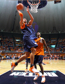 James Augustine shoots a lay-up at the annual Orange and Blue Scrimage at Assembly Hall on Friday. The Blue team defeated the Orange, 58-55. Josh Birnbaum
