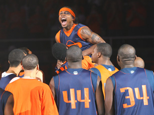 Dee Brown celebrates on the court with teammates at Midnight Madness, the basketball team´s first official practice, at Assembly Hall on Friday. Josh Birnbaum
