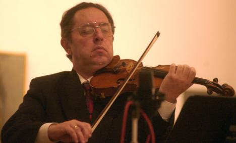 Violinist Sherban Lupu plays "Romanian Airs for Solo Violin" by George Enescu as part of the WILL-FM Second Sunday Concerts at the Krannert Art Museum on Sunday afternoon. Tessa Pelias
