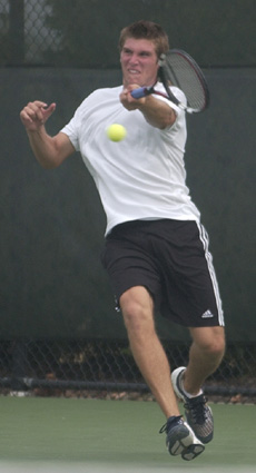 Ryan Rowe hits a baseline shot during practice at Atkins Tennis Center on Sept. 13. Nick Kohout
