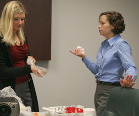Assistant Director of Fitness and Health, Janet Karoencke, right, speaks with Nutrition Education Coordinator, Justine Kraduck, from McKinley Health Center about recipes she presented during Lunch and Learn: Healthy Eating Even During the Holidays at CR Adam Babcock
