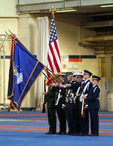 Members of the ROTC color guard display the colors in the Armory on Thursday as part of a Veterans´ Day remembrance ceremony. Ben Cleary
