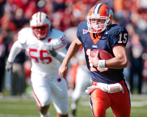 Illinois quarterback Tim Brasic carries the ball in the third quarter of the game versus Wisconsin on Saturday at Memorial Stadium. Brasic was Illinois´ top rusher for the game with 116 yards on 16 carries. Peter Hoffman
