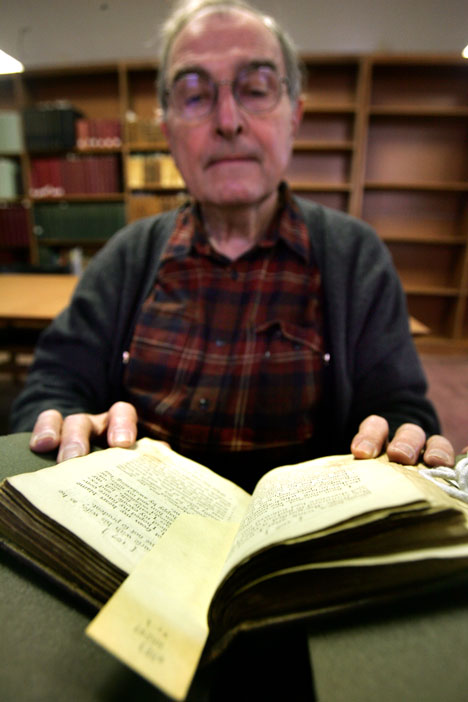 John Dussinger, Professor Emeritus of English, reads a book about penitence in the Magdalen House at the Rare Book and Manuscript Library on Tuesday afternoon. Troy Stanger
