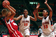 Forward Audrey Tabon guards forward Danielle Ward during the Illinois vs. Wisconsin basketball game Feb. 9 at Assembly Hall. Illinois lost to Wisconsin, 66-61. Tedd Anderson
