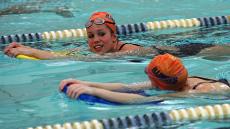 From left, Illinois swimmers, Christina Brunka and Meghan Farrell, practice at Freer pool on Sunday afternoon. They, along with fellow swimmers Rebecca Poetz and Barbie Viney, qualified to compete in the NCAA Championship Tournament in Athens, Ga., March Josh Birnbaum

