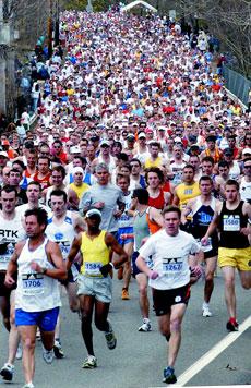 The 110th Boston Marathon elite runners lead the race, Monday, after crossing the start line in Hopkinton, Mass. Over 20,000 runners crossed the start line during the 110th Boston Marathon, heading toward Boston from downtown Hopkinton, Mass., Monday. The Associated Press
