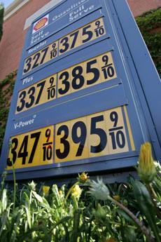High gas prices are listed at a Shell gas station in Menlo Park, Calif., May 2. Royal Dutch Shell PLC said first-quarter profit rose 3.1 percent, boosted by the high price of oil, but the company said it may not meet earlier targets in restoring its prove The Associated Press
