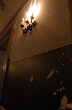 Paint cracks off the walls in the Lincoln Hall Theatre on Tuesday afternoon. Tessa Pelias
