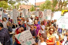 Protestors from, and in support for, Local Union 698 rally in front of the Lester H. Swanlund Administration Building at 601 E. John St. in Champaign, Thursday, June 29th, at noon. Local Union 698 represents several workers throughout the University from Beck Diefenbach

