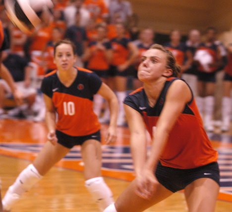 Amy Palash sets up for a bump while Kristine Anderson readies herself for her next move against the Illinois State Redbirds on Friday night at Huff Hall. The match was a win for the Illini in the State Farm Illini Classic. Suzanne Stelmasek The Daily Illini
