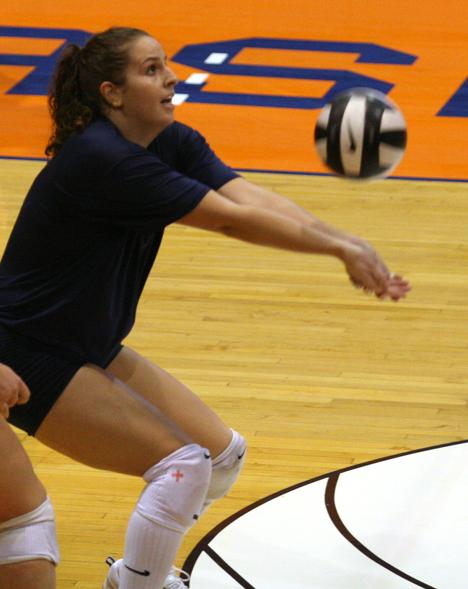 Senior Meghan Macdonald gets under the ball for a bump during practice in Huff Hall, Wednesday. Adam Babcock

