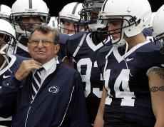 Penn State coach Joe Paterno waits with his team before their game against Youngstown State. The Associated Press
