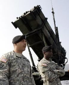 U.S. soldiers stand in front of a Patriot Advanced Capability-3 during the Defense Asia 2006 festival at the Army headquarters in Daejeon, south of Seoul on Wednesday. Lee Jin-man, The Associated Press
