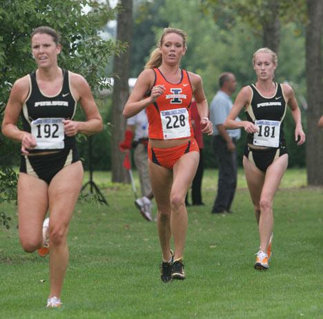 Josh Birnbaum The Daily Illini Ilinois Jamie Kuhl runs during the 4K Illini Open cross country meet at the Arboretum in Urbana on Friday, Sept. 1, 2006. Kuhl placed 14th with a time of 15:01.59 in a race that included individuals from Marquette, Purdue, Illinois State, and Eastern Illinois.

