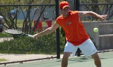 Marc Spicijaric returns a volley to Minnesota on Saturday at the Atkins Tennis Center. Jamey Fenske, The Daily Illini
