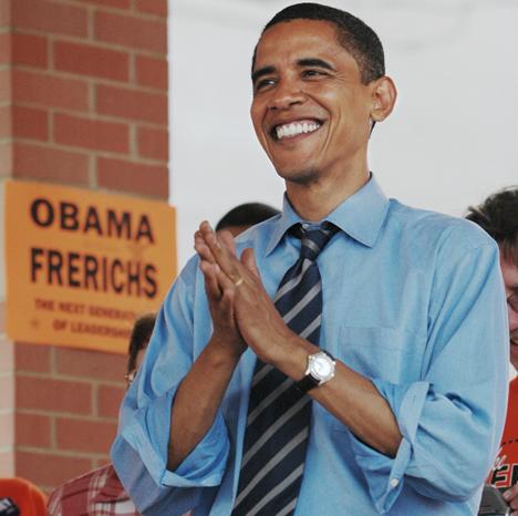 Barack Obama, United States Senator, applauds Mike Frerichs before being called to the podium to speak to a crowd of supporters in Danville, Wednesday. Obama spoke in support of Mike Frerichs, who is running as the Democratic candidate for Illinois State Brad Vest
