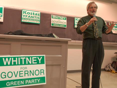 Rich Whitney, Green Party candidate for governor, speaks at a Green Party campaign rally at Everitt Hall on Monday night. Whitney stressed the importance of breaking the ties between politics and corporate interest, saying, The Green Party does not accep Dan Hollander
