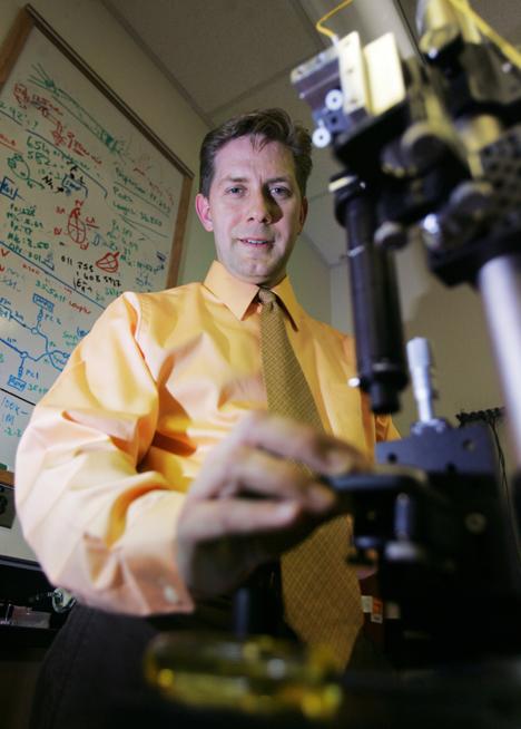 Stephen Boppart, a member of the Beckman Institute Nanoelectronics and Biophotonics Group as well as an associate professor in electrical and computer engineering and bioengineering, is at the forefront of breast cancer-detecting technology. To his right Josh Birnbaum

