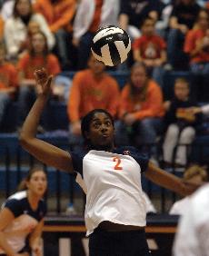 Vicki Brown (2) returns the ball during the first game of the match against Indiana University at Huff Hall, Friday Nov. 17. Beck Diefenbach

